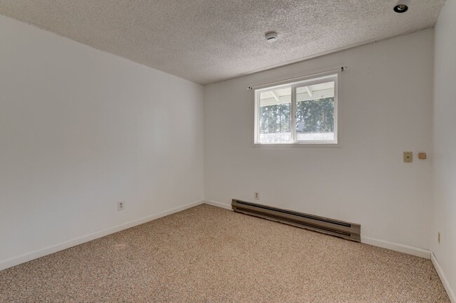 Building Photo - Spacious 4-Bedroom Home with Fireplace, Fenced Yard, and 2-Car Garage