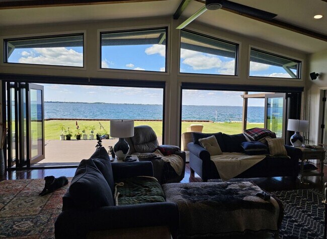 Building Photo - Offered for Rent – Available April 1, 2026 St. Lawrence Seaway Luxury Waterfront Home – Cape Vinc...