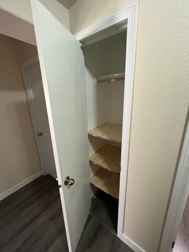 Small closet on hall - 14902 Golden Delicious St