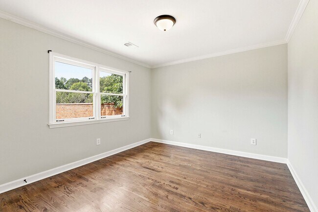 Building Photo - Charming 3BR Townhome with Elevator in the Heart of Fayetteville