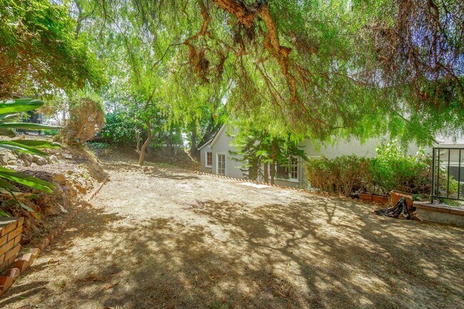 Building Photo - MUST SEE! Unique and Charming 4 bedroom 2.5 Bath Home w/Stunning Views!