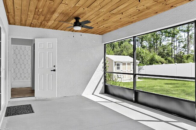 Building Photo - Modern 4-Bedroom, 3-Bath Home with Private In-Law Suite – Palm Coast, FL