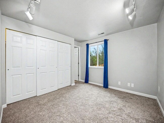 Building Photo - Spacious 4-Bedroom Lacey Home with A/C, Basement Bonus Space & Wetlands Privacy