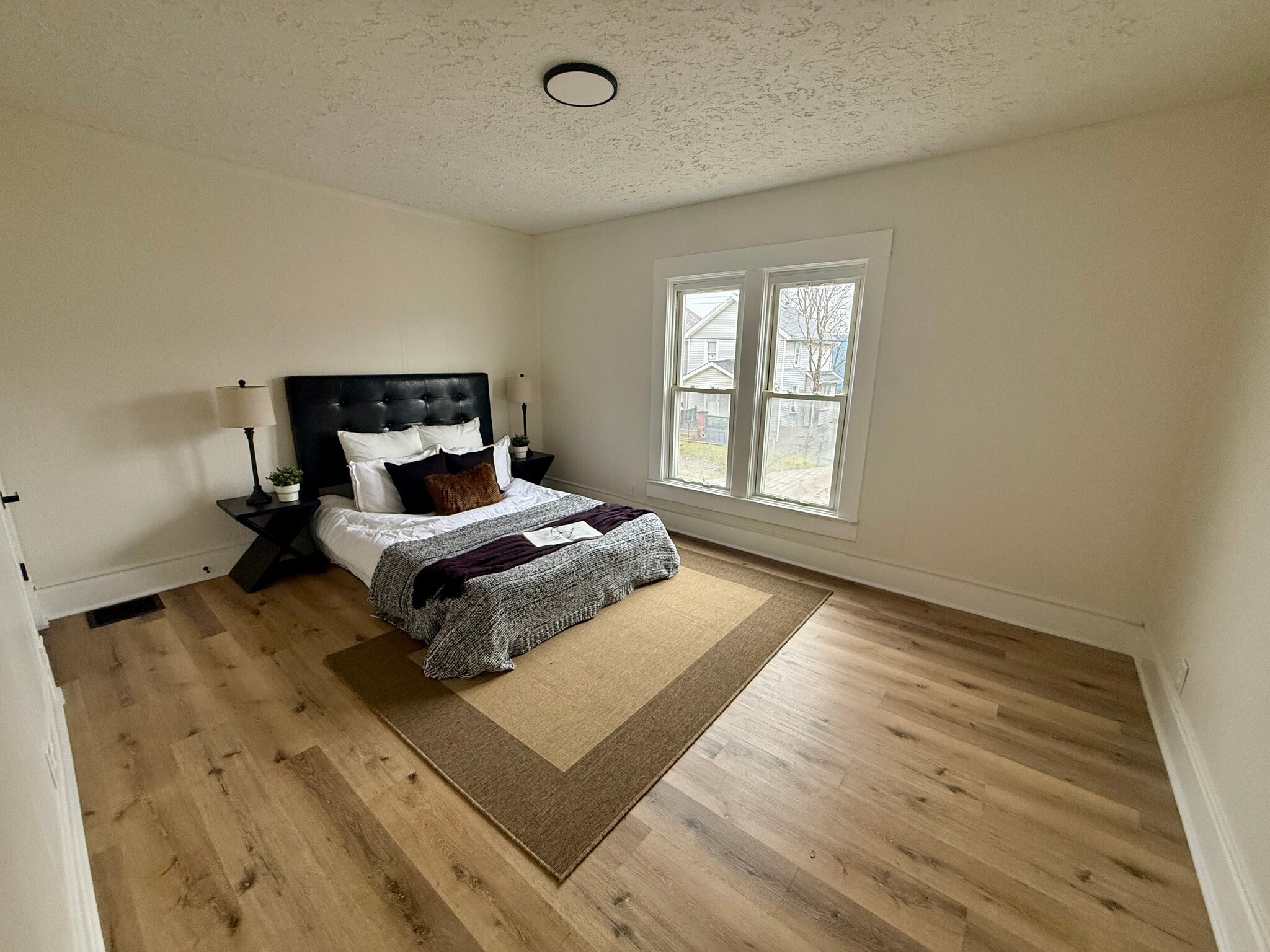 Building Photo - 130 E Woodrow Ave