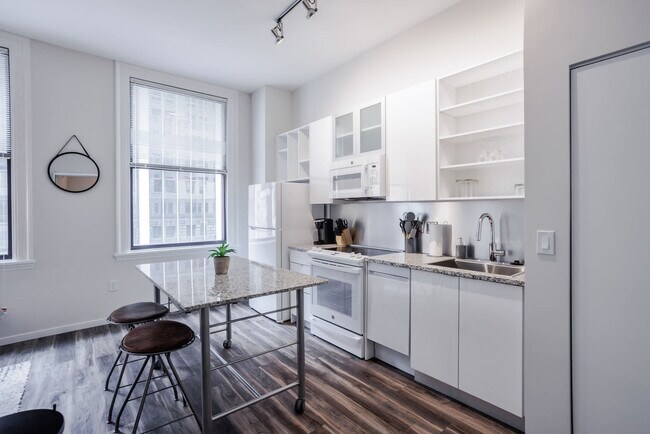 Building Photo - 9-JAN-JAN E 4th St