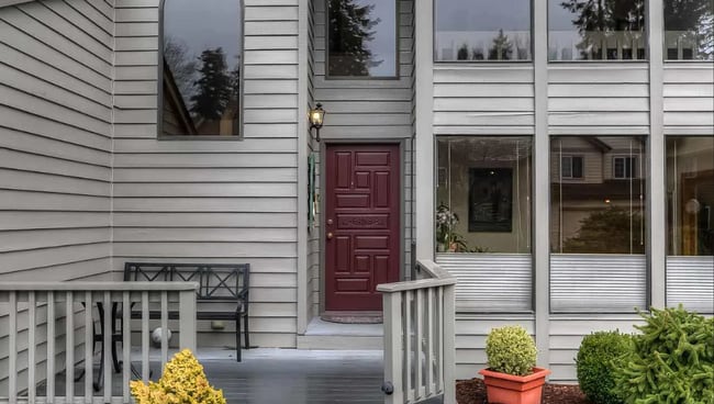 Building Photo - 4bd/3ba HUGE Home w/Hardwood Floors, Russian Fireplace, 2-Car Garage & Fenced Back Yard!