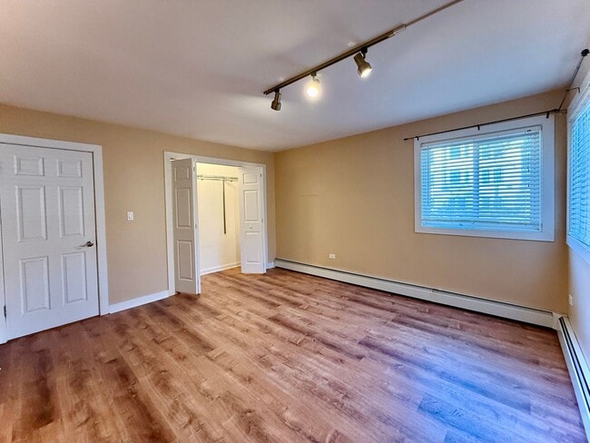 Building Photo - Pristine 2 Bedroom, 1 Bathroom Condo Available NOW! Heat, Water, & Parking INCLUDED in Rent!