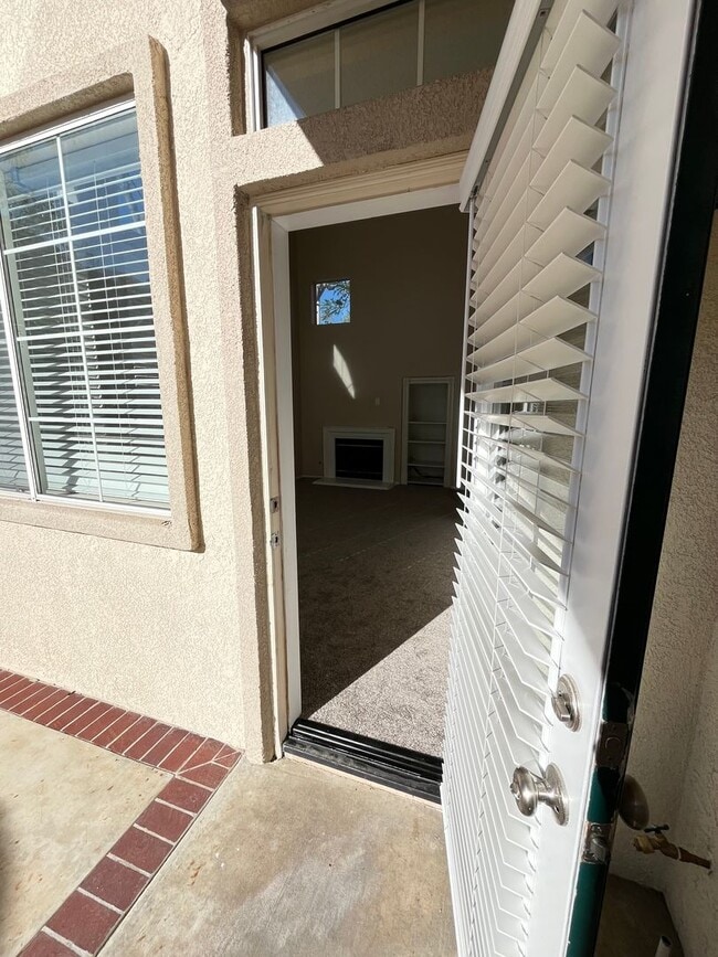 Building Photo - PICTURE PERFECT!  3 BR/3 BA END UNIT CONDO with DIRECT ACCESS 2 CAR GARAGE