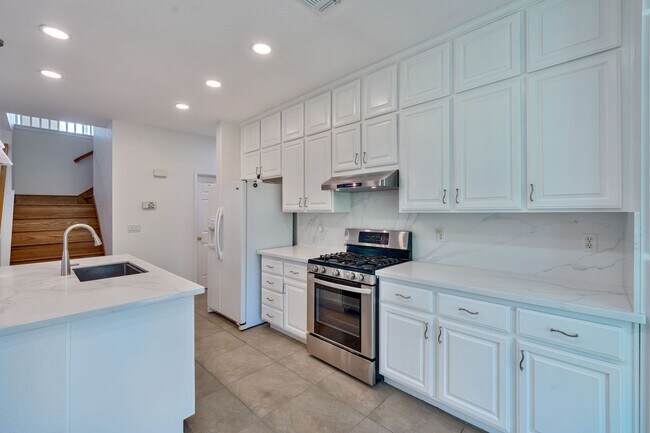 Building Photo - Spacious 4-Bedroom Home, Beautifully Maint...