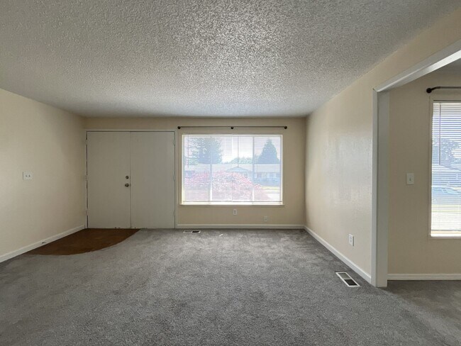 Building Photo - Charming Ranch Home with Sunroom or 4th Bedroom, Two-Car Garage and Fenced Backyard