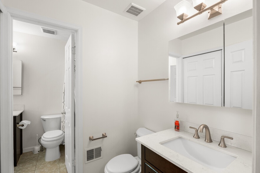 2nd level half bath - 8063 Dulciana Ct