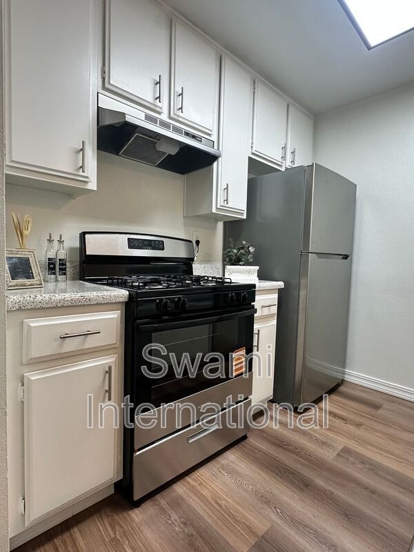 Building Photo - 26120 Belle Porte Ave