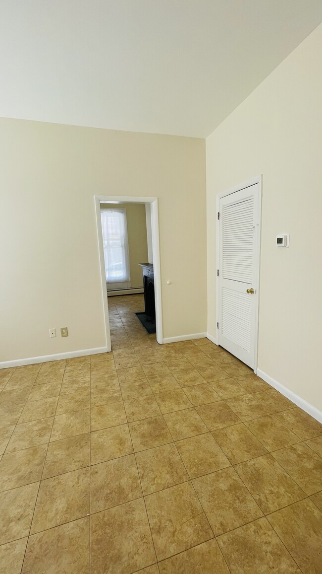 Bedroom- view into living room - 80 Main St