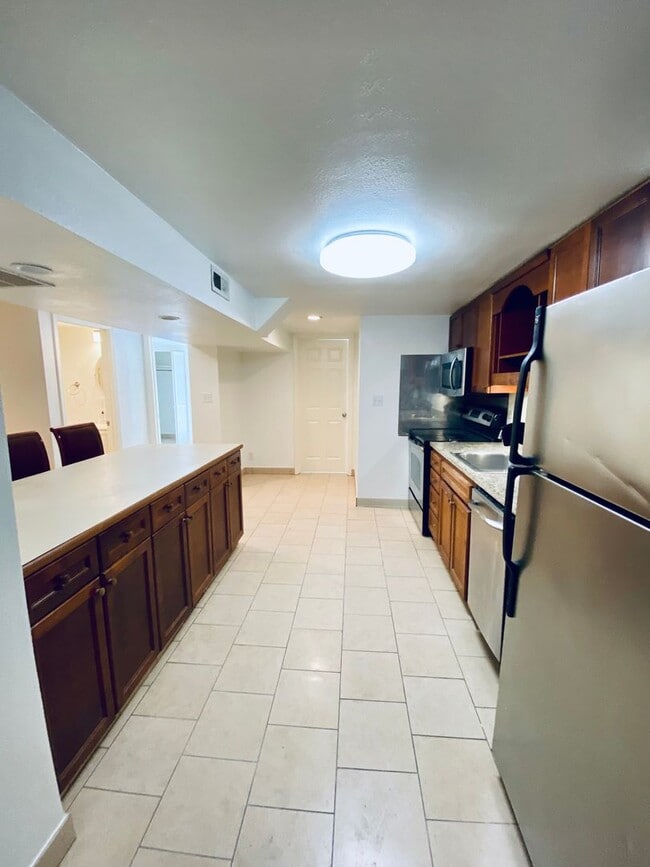 Building Photo - {5639} Spacious Ranch + Two Separate Living Quarters + Fenced Yard!