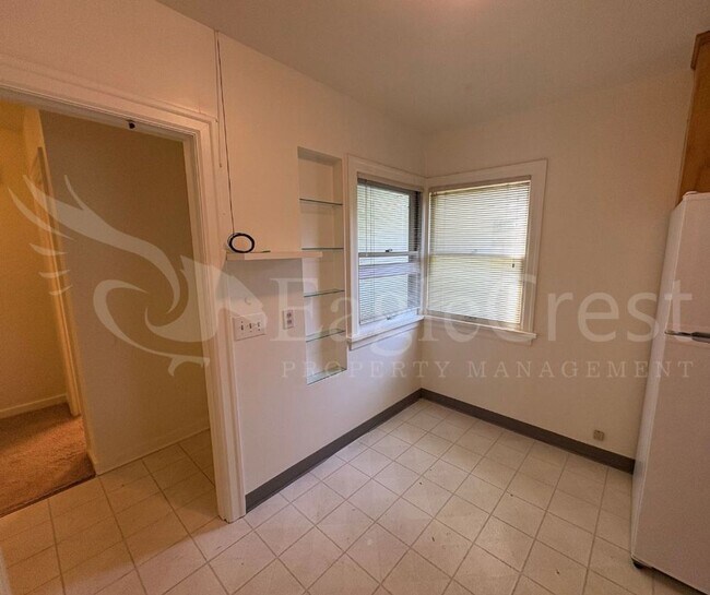 Building Photo - Three Bedroom, Two Bathroom House with Fenced Yard and Outdoor Fireplace