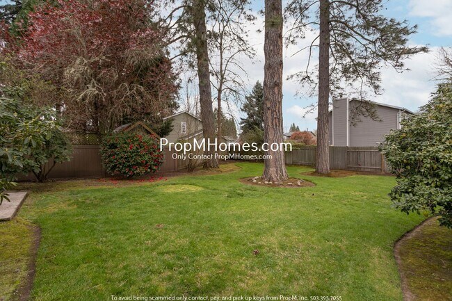 Building Photo - Three Bedroom Aloha Home with Park-Like Backyard!