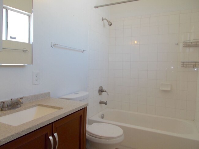 Building Photo - 4-Bedroom Home with Spacious Backyard