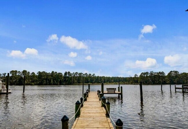 Primary Photo - Waterfront 3BR/2BA Home in Gated Marina Co...