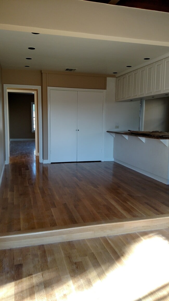 Upper den view of step downer den - 5835 Tellefson Rd