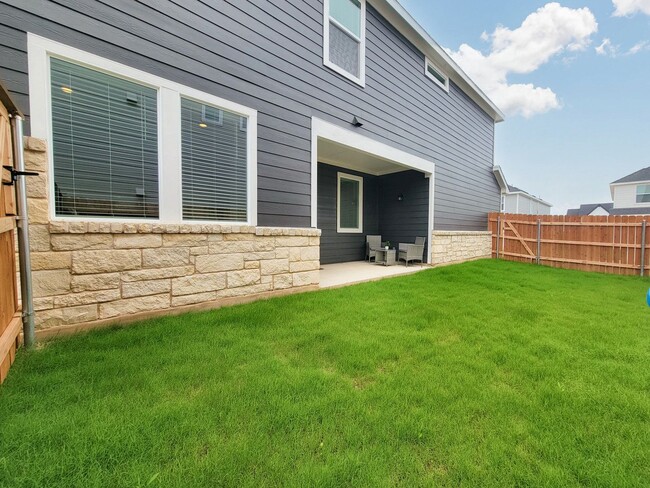 Building Photo - Spacious 4/BR 2.5/BA Retreat with Fenced Yard and Smart Features