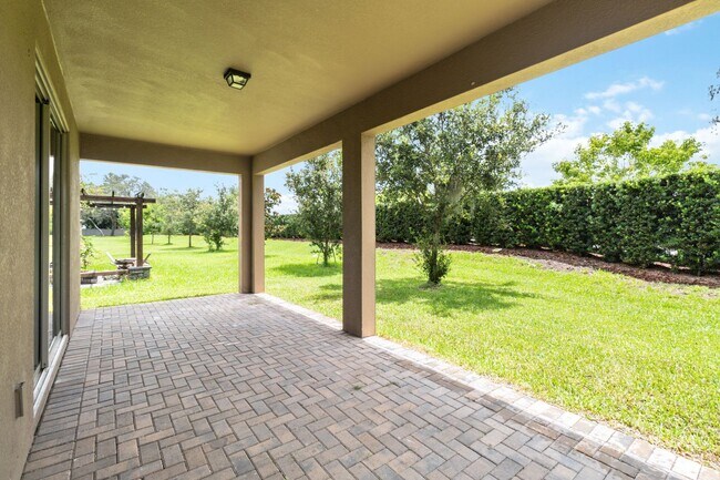Building Photo - Gorgeous Energy Efficient 4/2 Home in Gated Community Close to Lake Nona
