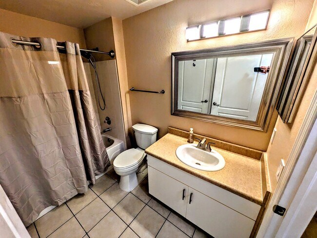 Building Photo - ANNUAL UNFURNISHED GROUND FLOOR CONDO 3 BED 2 BATH