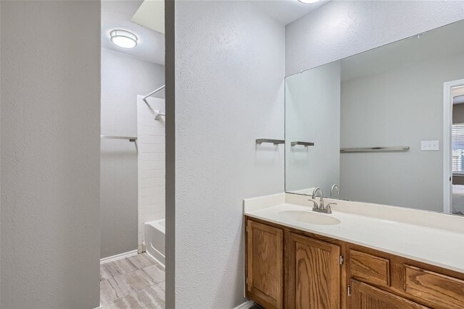 Building Photo - Charming 3/2/2 with Private Fenced Backyard!