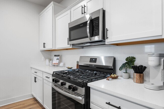 Building Photo - Brand New Three Bedroom Townhome in West L...