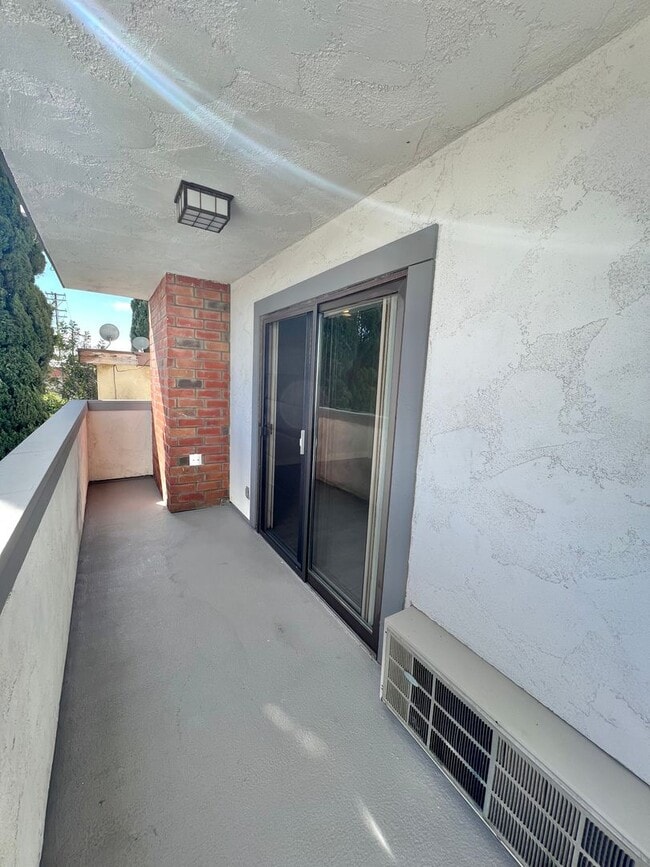 Building Photo - Resort-Style Coastal Studio with Pool, Jacuzzi & Rooftop