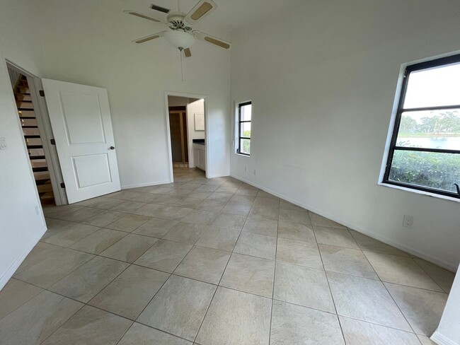 Building Photo - ANNUAL RENTAL - 2 + DEN / 2 BATH VILLA AT ...