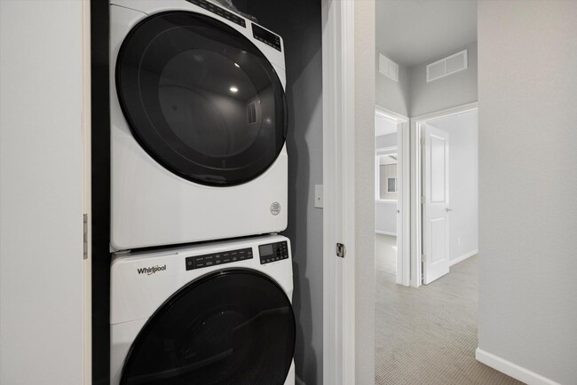 Building Photo - Gorgeous NEW Three Story Townhome with two car attached garage!