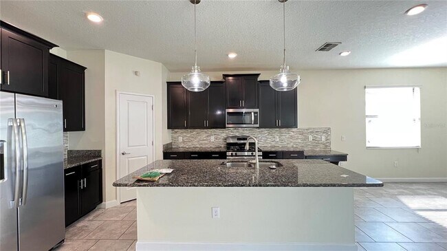 Building Photo - 7755 Purple Finch St