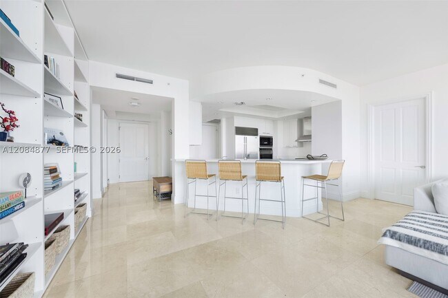 Building Photo - 10295 Collins Ave