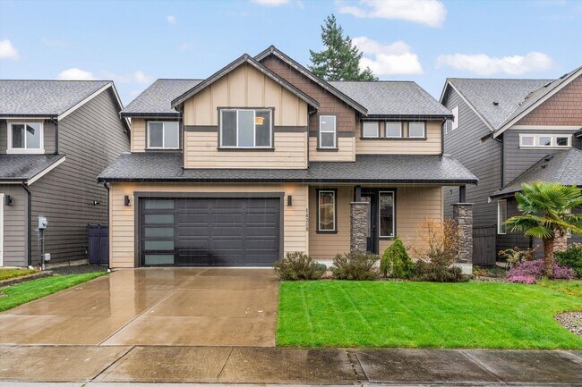 Building Photo - Backyard Putting Green + Outdoor Fireplace | Comfortable Puyallup Rental