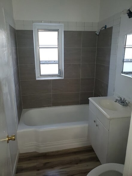 New Bathroom Tiling. New Toilet - 1937 Madison St