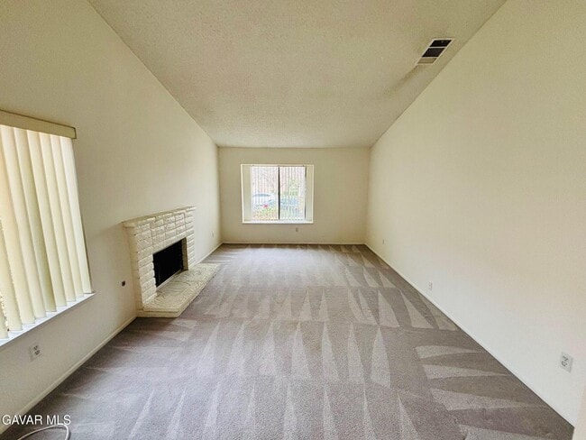 Building Photo - 3220 E Ave S2