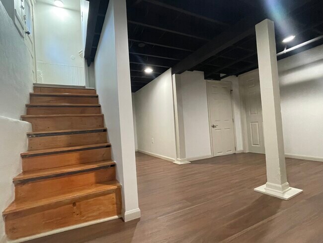 Basement staircase and Living room - 10212 Plymouth Ave