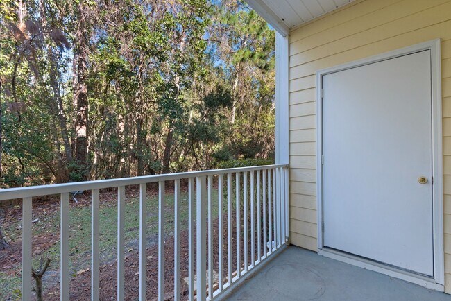 Building Photo - Fully Renovated 2B/2B condo located behind...