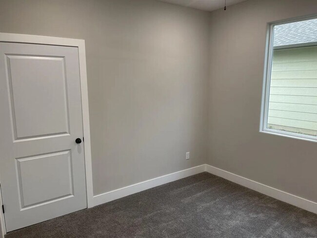 Building Photo - Single family slab home with three car garage. This home is 4 bedrooms, three bathrooms open floo...