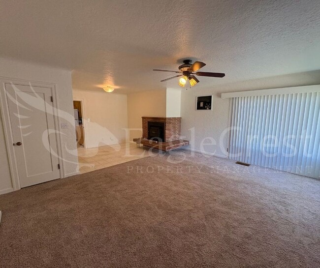 Building Photo - Three Bedroom, Two Bathroom House with Fenced Yard and Outdoor Fireplace