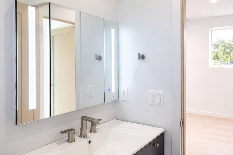 Medicine Cabinet (3 panel) with storage shelves and LED lighting - 3355 Virginia Ave