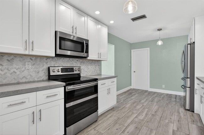 Building Photo - 7613 NW 67th Ave