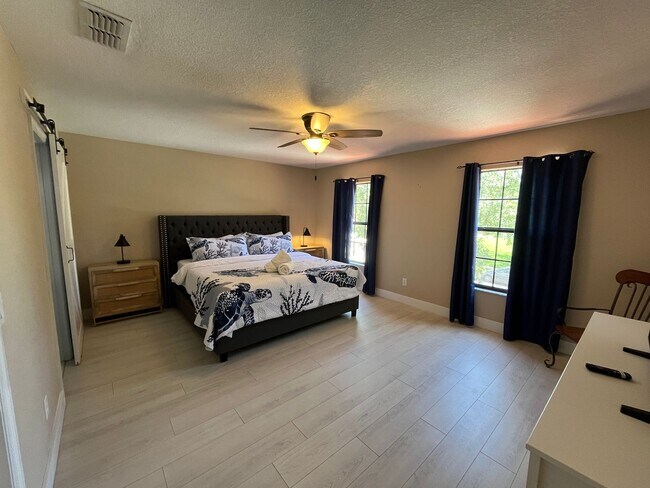 Building Photo - Beautiful Mediterranean Pool Home Availabl...