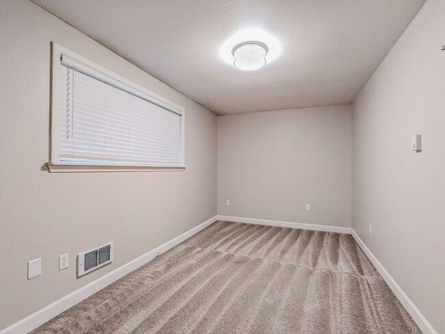 Building Photo - Updated & move in ready 3 bed 2 bath rambler w/ 2 car garage!