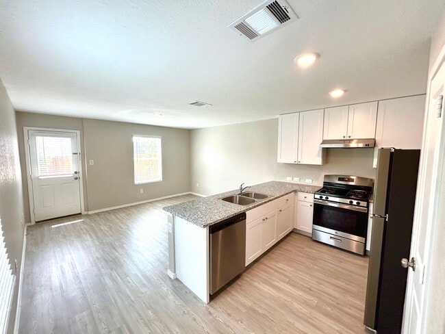 Building Photo - *COMING SOON* Modern Two-Story Home with Garage & Fenced Yard!