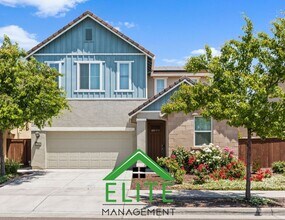Building Photo - **Modern single-family residence in the hi...