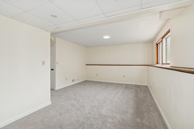 Building Photo - 8983 Vinewood Ln N