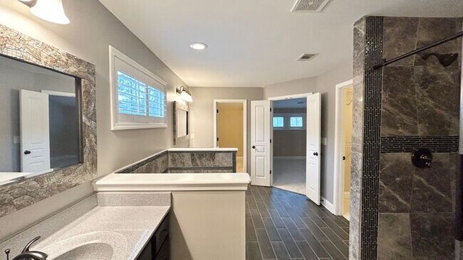 Building Photo - Stunning Cumming Executive Home, Hand Scraped Hardwoods, Custom Upgrades!