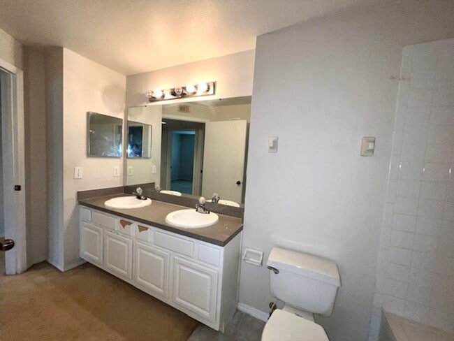 Building Photo - Move in NOW- Spacious 2 bedroom 1 bath condo on 3rd floor in gated community! Water included with...