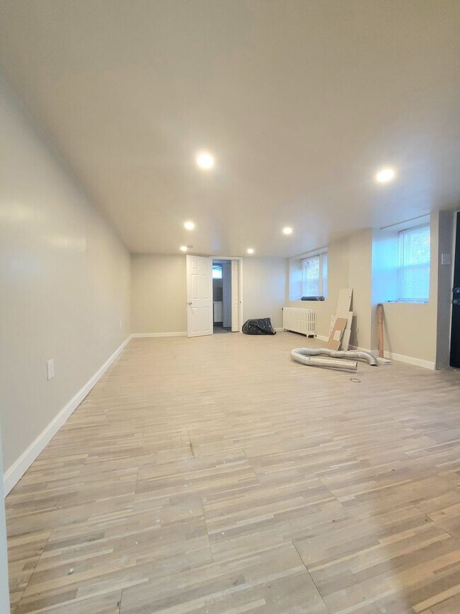 Building Photo - Stunning 4-Bedroom Townhome with Finished ...